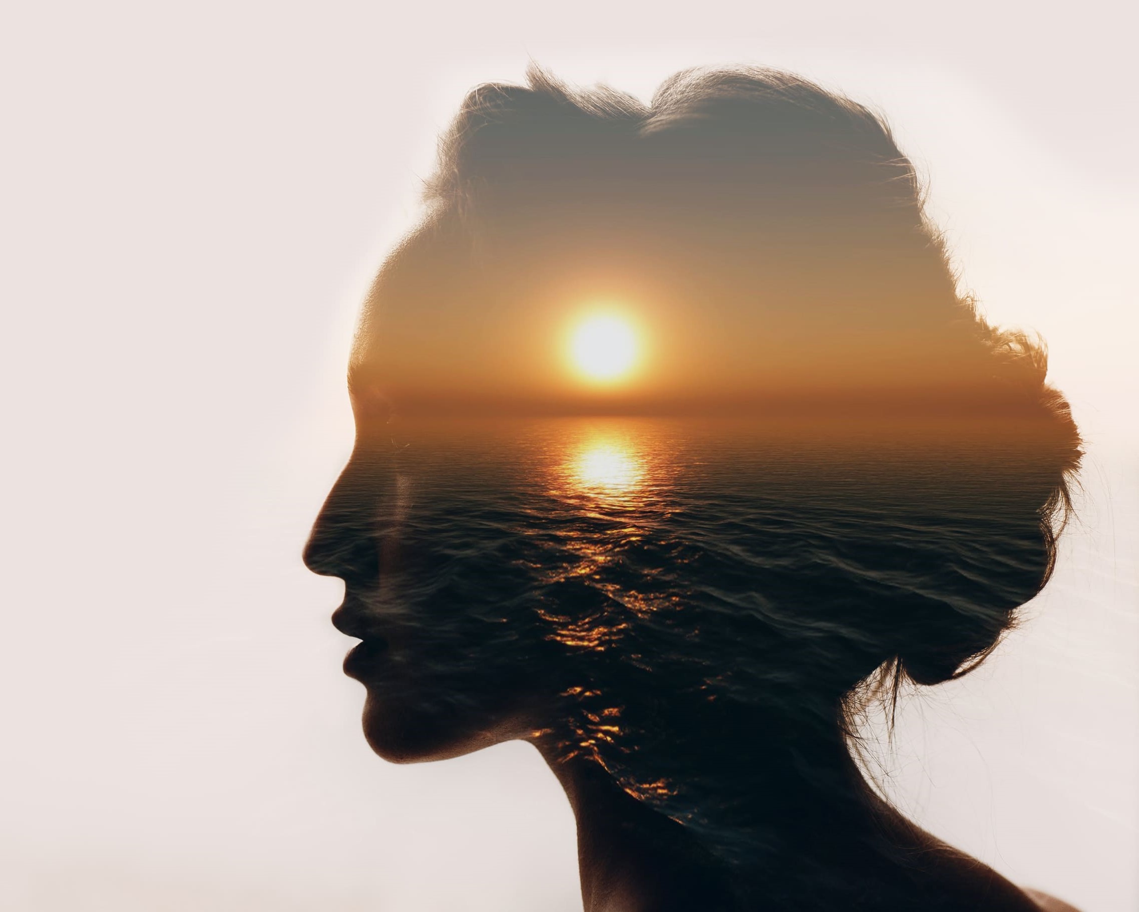multiple-exposure-sunrise-and-sea-inside-woman-sil-2024-11-26-13-15-25-utc